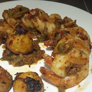 Sautéd Prawns with olive & feta sauce & minted potatoes